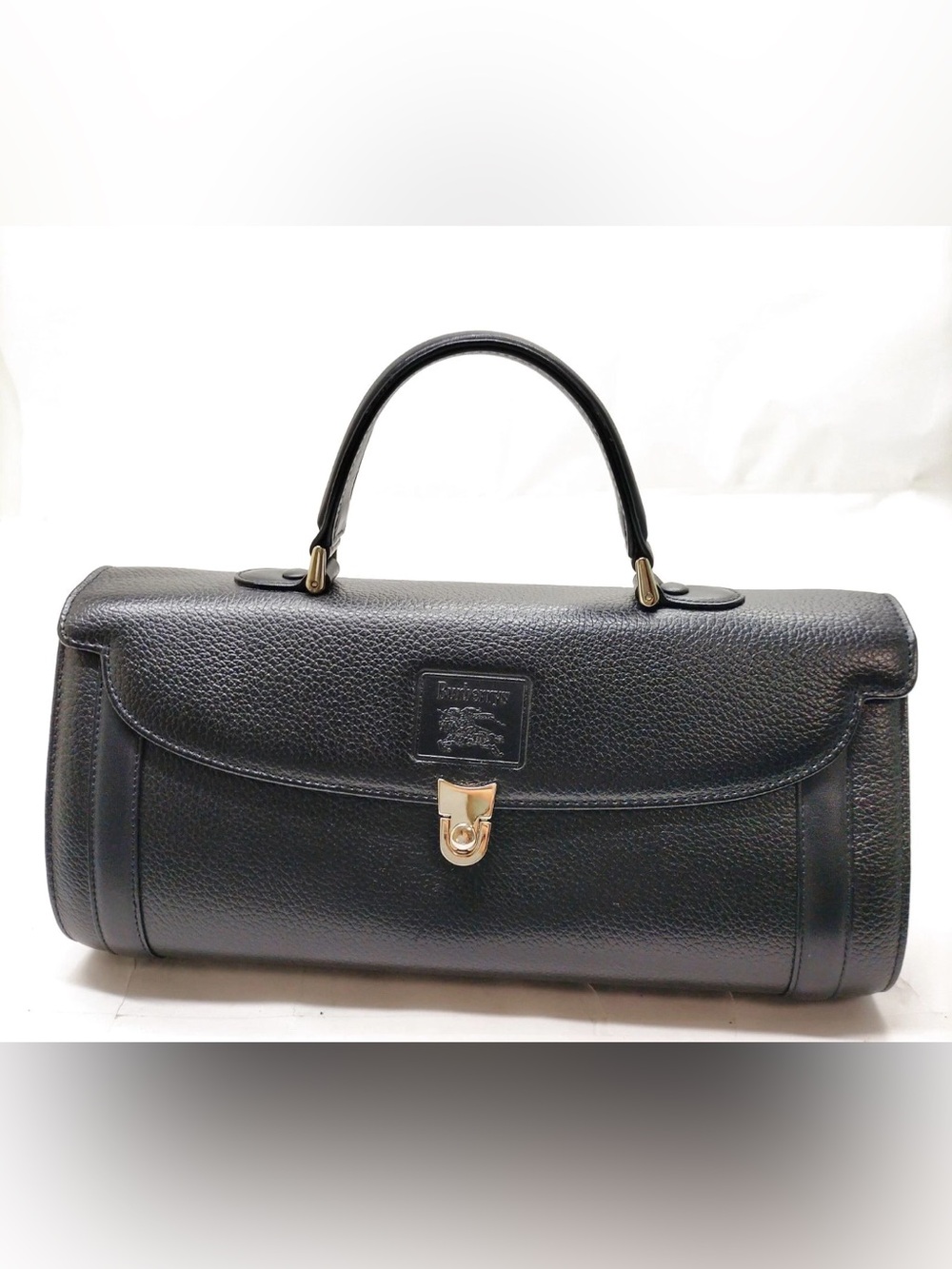Authentic Vintage Burberrys Black Pebbled Leather Barrel Bag - Pre-1999